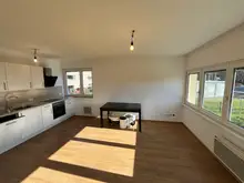 Wohnzimmer mit Küche